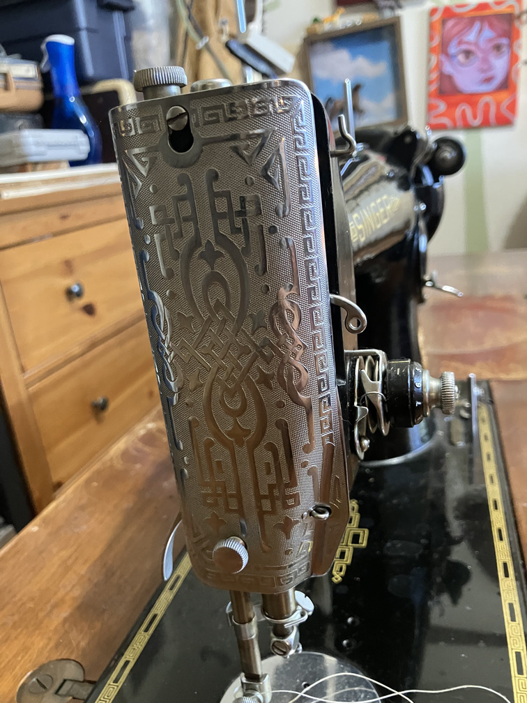 Face plate and needle bar